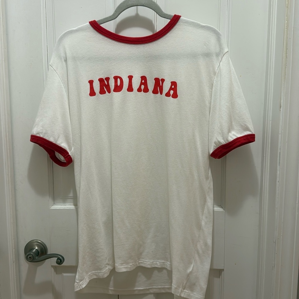 White “Indiana” baseball tee. Size L. By Emily Roggenburk. Wore once